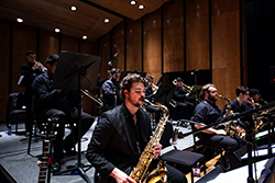 Saxophone section performs in concert
