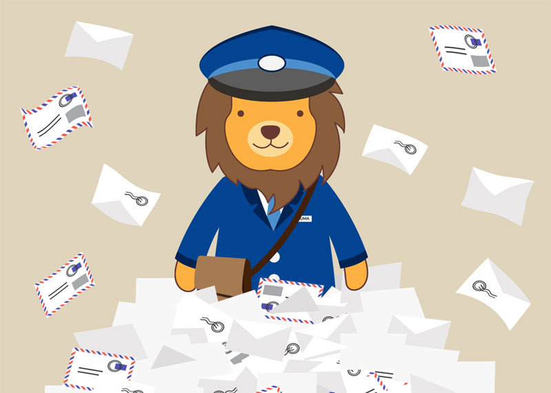 Numa, dressed as a mail carrier in a pile of letters.