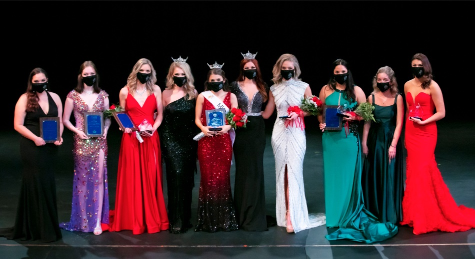 Miss UAFS contestants are shown with their awards donning face masks