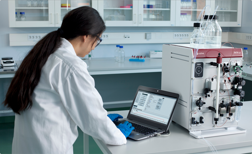 a scientist works on the ATKA Go chromatography system