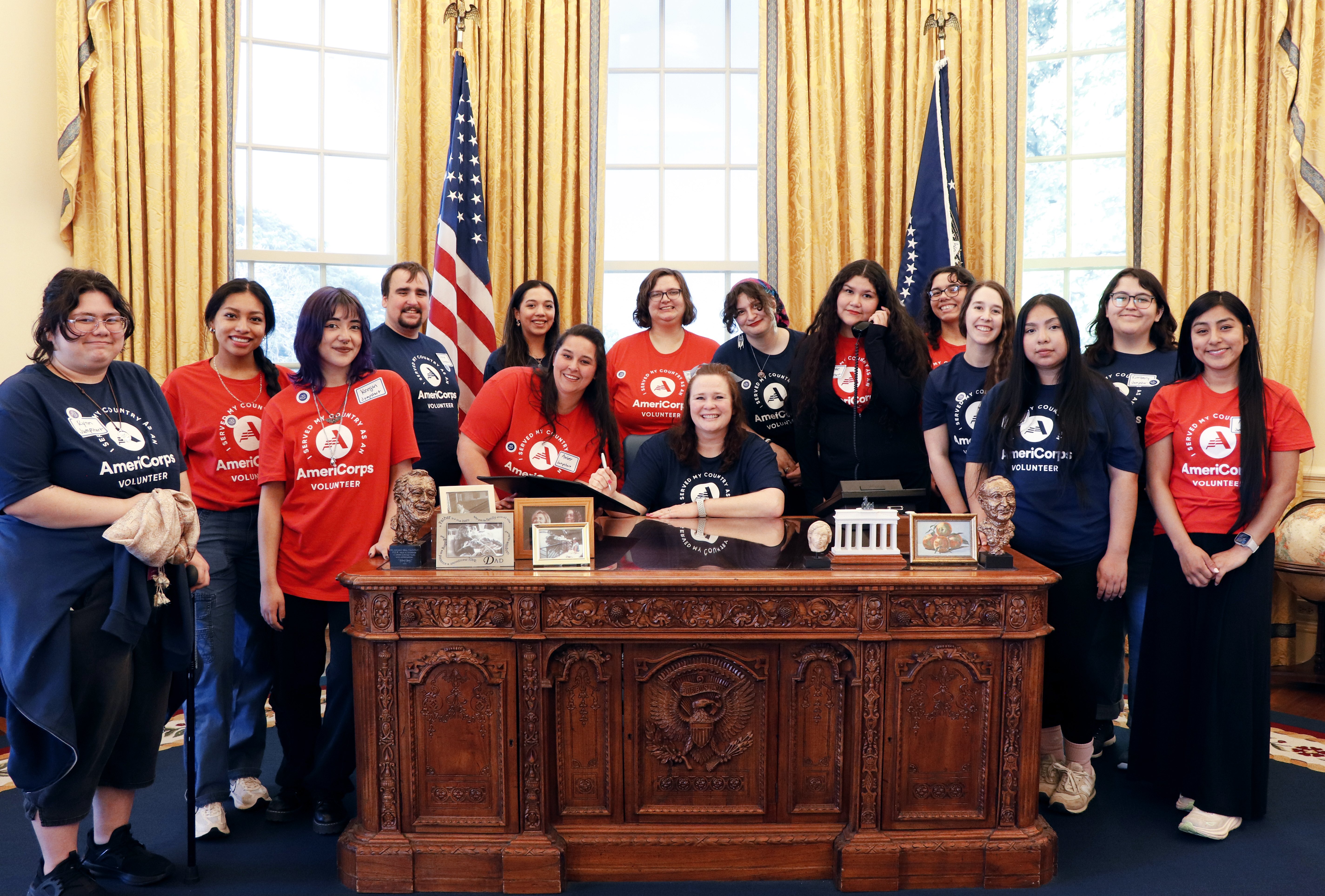 Americorps members of UAFS pose for a photo with RoarCorps director Corri Brosius