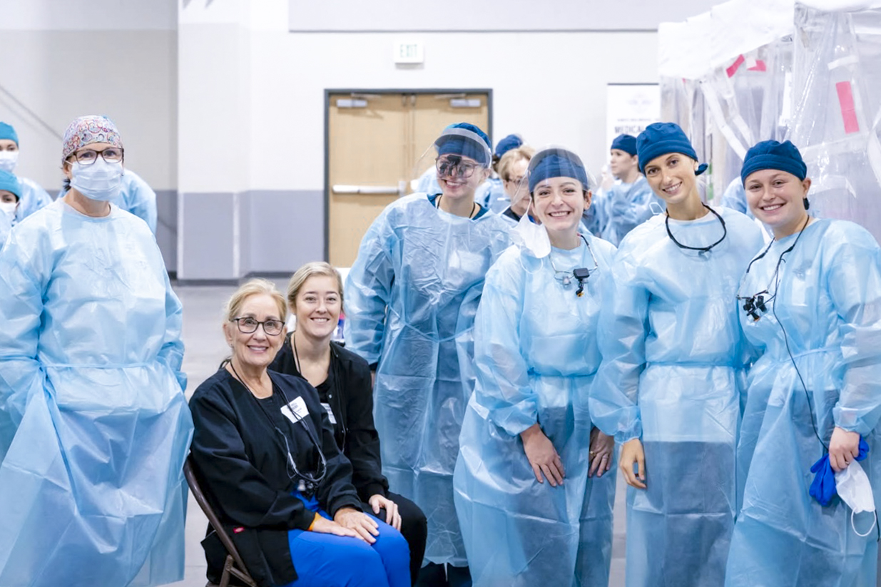 UAFS dental hygiene students and faculty pose during a break from community care at the second annual RAM.