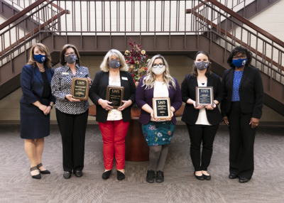 UAFS Faculty Members pose with their awards
