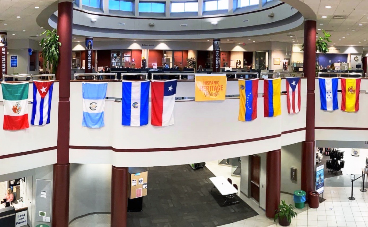 flags hang above the UAFS campus center atrium
