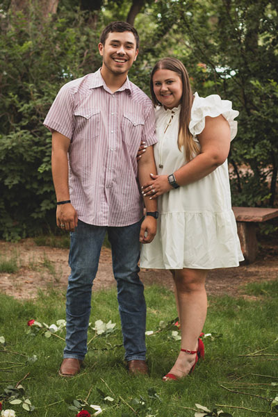 Logan and his fiance Alexis Davis, class of '22