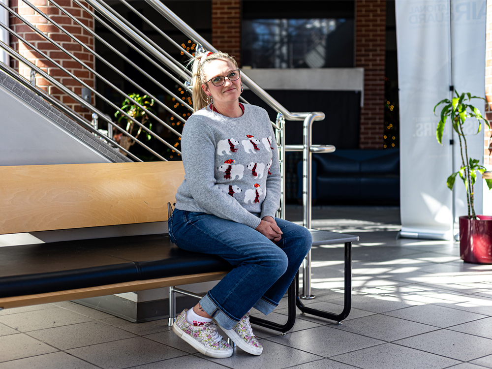 UAFS Staff Accountant Lorin Nhongvongsithi poses for a photo in the Smith-Pendergraft Campus Center.