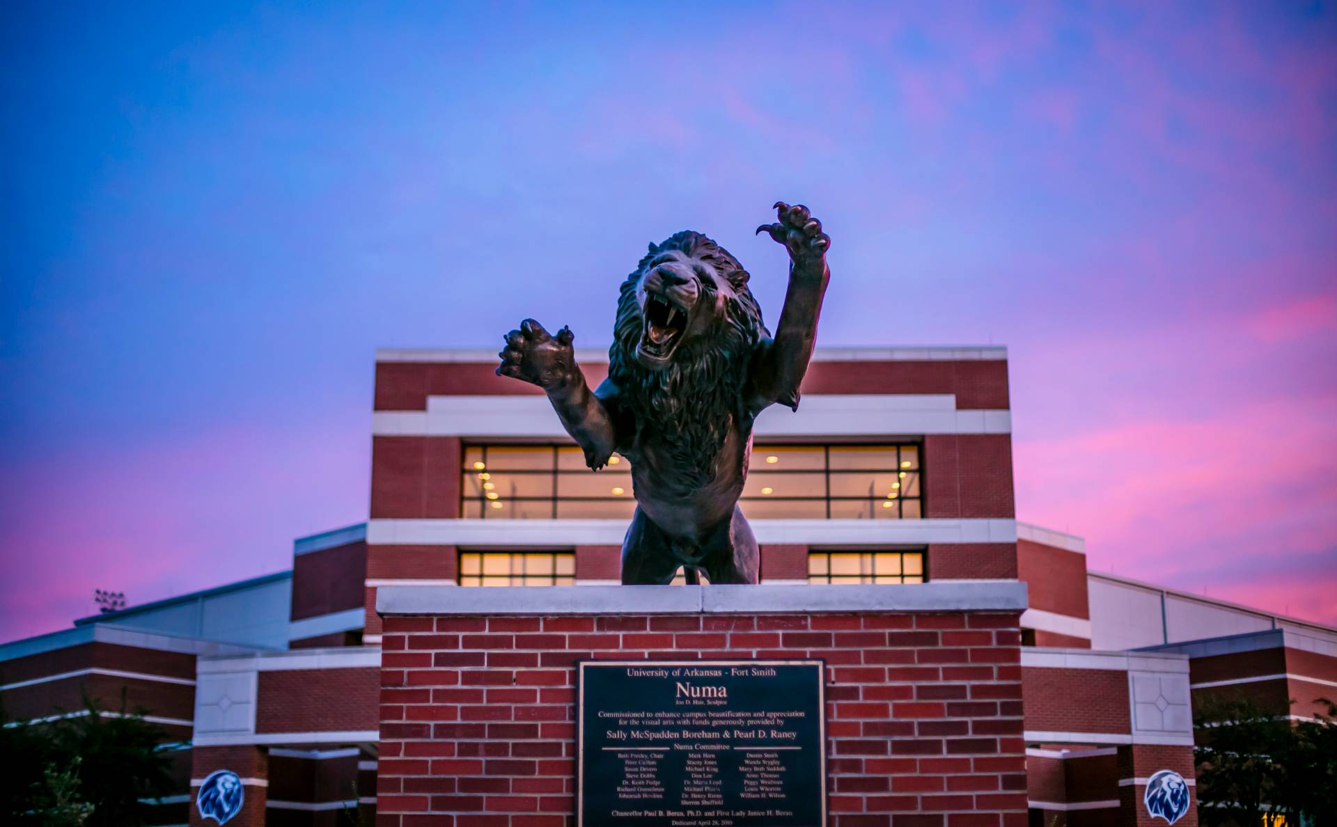 The Numa Lion statue roars over a sunset
