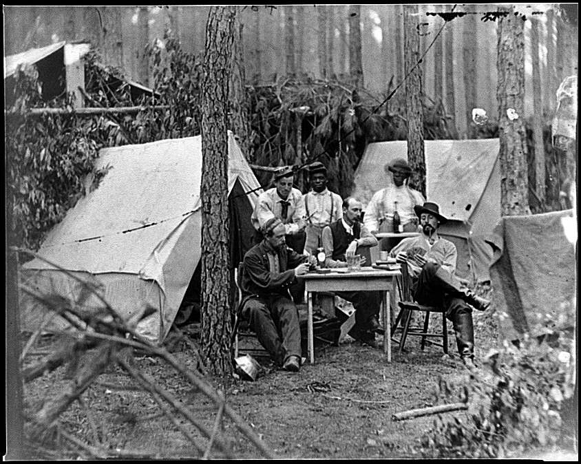 Petersburg, Va. Officers of the 114th Pennsylvania Infantry playing cards in front of tents