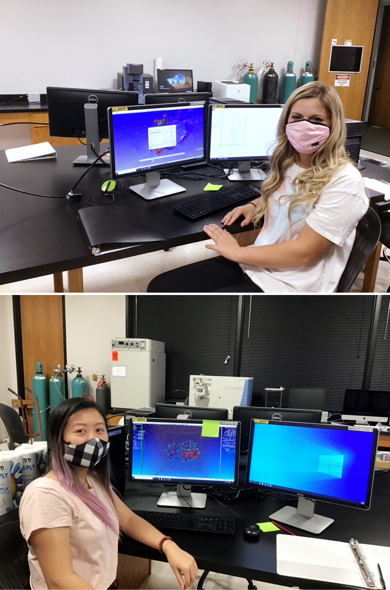 UAFS students pose with computers where they are working on their research